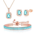 Paris Jewelry 18K Rose Gold Created Aquamarine Princess Halo Pendant Necklace, Earrings and Tennis Bracelet Jewelry Set Plated