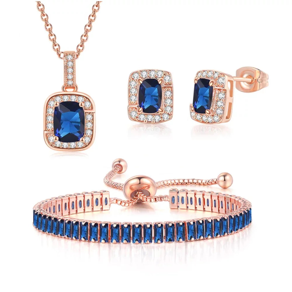 Paris Jewelry 18K Rose Gold Created Blue Sapphire Princess Halo Pendant Necklace. Earrings and Tennis Bracelet Jewelry Set Plated